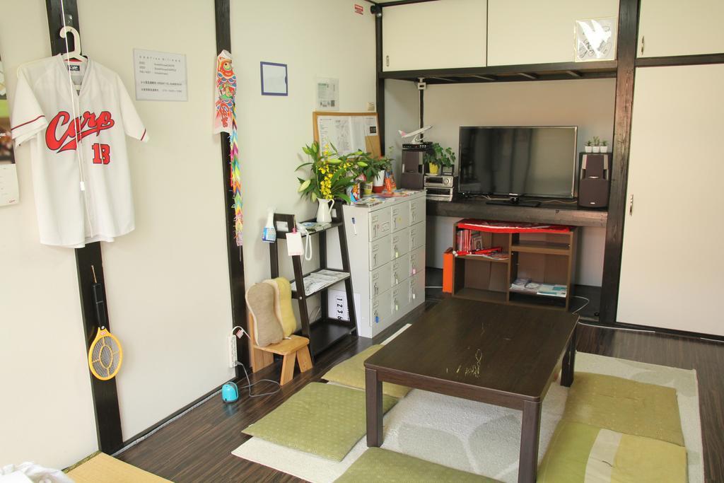 Guest House Carpe Hiroshima Koi Экстерьер фото